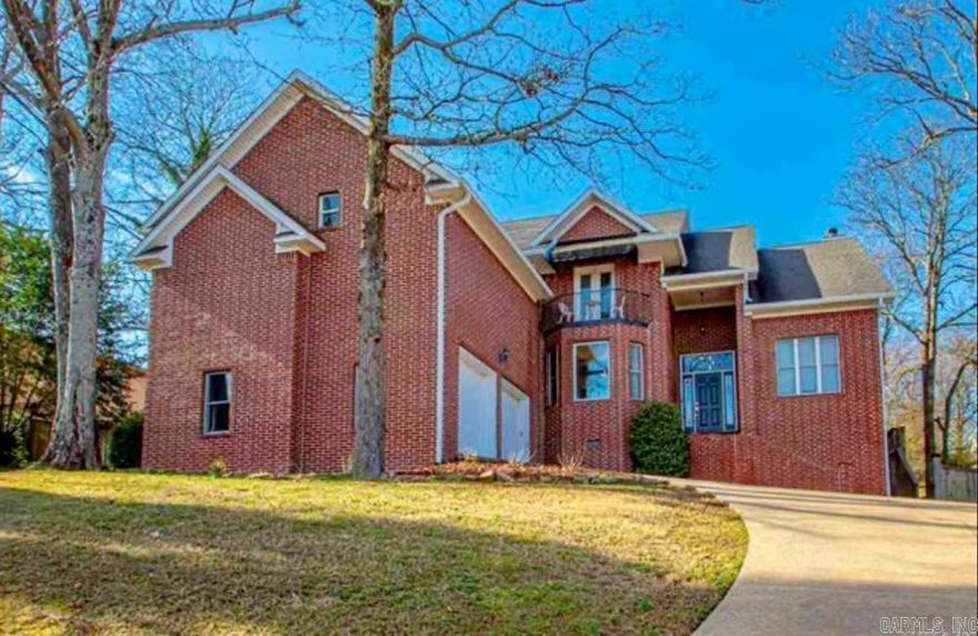 Spacious elegance meets comfort as you step into this stunning home of over 4,600 sq. ft. where style, space, and functionality come together beautifully and can accommodate your large family. As you enter inside, take a look at the large living room with soaring ceilings and a cozy fireplace. To the right, you will see a dedicated home office that is currently being used as a 5th bedroom, offering flexibility to your needs. A formal sunlit dining room provides plenty of space for entertaining, while the stylish kitchen shines with stainless steel appliances, stately blue cabinetry, and ample counter space. There you will also see the large breakfast room that overlooks the back yard. The primary suite features an exceptionally large bedroom, private en-suite bath, and generous walk-in closet.  The home is equipped with two laundry rooms, one on each floor, making that chore less exhausting. This home offers dual staircases leading to the upper floor where you will find a huge entertainment room, 3 oversized bedrooms, 2 full bathrooms, and a massive walk-in attic for all your storage needs. Step outside to the privacy-fenced backyard with a large deck, fire pit, and potting shed.