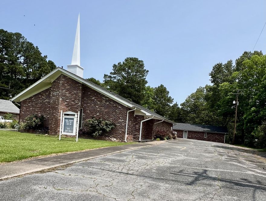 Previous church facility. Any use allowed by seller, check with city planning commission. Over 5k square feet combined space. 3300 SF sanctuary and classroom building and 1980 SF fellowship hall. Appointed offices, classrooms, storage closets, and fellowship hall with full kitchen. 4 restrooms. Asphalt parking. Property being sold as-is present condition. All showings must be accompanied by a Realtor. NO Disclosures provided by seller. Existing personal property will remain but will not be considered part of the sale.  Any items left in the building will be considered as-is and abandoned and will have zero value.  Seller makes no guarantees, warranties, or representations of any kind regarding the existence, condition, or usability of said personal property which will remain in building at closing. Title transferred by Special Warranty Deed/Trustee Deed.