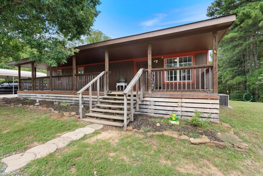 Affordable 3 bed 2 bath Home on over 1/2 acre with No Restrictions and an Additional 24 x 36 Workshop with office space and extra loft space located on the outskirts of Greenbrier. Large covered front porch and back deck perfect for relaxing in the afternoon. Wood flooring and Wood Burning Fireplace create a rustic vibe for winding down a the end of the long day. Call today for your private showing. New Survey on file.