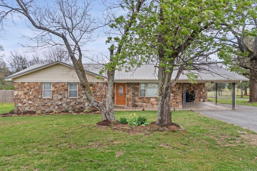 Out in Velvet Ridge, you’ll find a rock home that just feels right - 1,727 square feet of simple, comfortable living with room to spread out! There’s a carport, an extra living space that makes a perfect den or hangout spot, and an open kitchen where everyone naturally gathers. The oversized laundry and storage area gives you all the space you need for real everyday living. Step out back and enjoy a fully fenced yard, a storage shed (2024), and a big deck that’s perfect for slow mornings, grilling out, or winding down in the evenings. Plenty of yard space to breathe and enjoy the outdoors—and the pool is negotiable, giving you options for summer days ahead. Inside, you’ve got newer paint throughout and a master bathroom that was remodeled in 2024, giving it a fresh, clean feel. The master bedroom features newer carpet along with his and her closets, giving you that extra space everyone appreciates. Big updates like the metal roof (March 2026) and gutters mean the hard work’s already been done. The home sits mostly on a slab, with the extra den on a crawl space. And being outside city limits, you’ll enjoy a little more room to breathe! Schedule your tour today! Agents, see remarks.