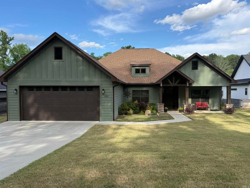Beautiful newer construction home located right on the Benton/Bauxite border in a small, peaceful subdivision. This stunning home features granite countertops throughout, a large farmhouse sink, and an open-concept living, kitchen, and dining area. The primary suite offers a luxurious bathroom with a tub, separate shower, dual vanities, and a spacious walk-in closet. Split bedrooms, LVP flooring throughout, a large pantry, and thoughtful built-in shelving in the closets, laundry, and living areas add both comfort and convenience. A mudroom/laundry room just off the garage makes daily living easy.  Outside, enjoy a covered patio with beautiful lake views, green space both in front and behind the home, and an extra-wide driveway with plenty of parking. Additional storage includes a huge floored attic with stairwell access and an exterior double-door storage closet perfect for lawn equipment and tools. The neighborhood also offers fiber optic internet. This home checks all the boxes AND qualifies for $0 down for qualified buyers and is available for easy Go and Show. Don’t miss this move-in ready gem!