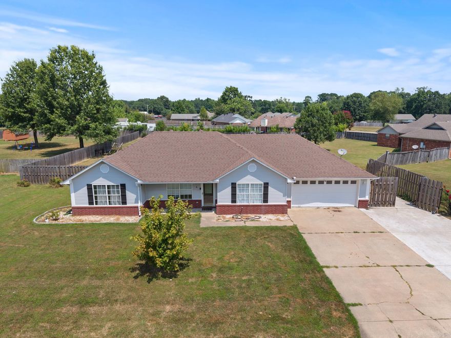 UP TO $5,000 IN BUYER CONCESSIONS PAID BY SELLER!!!! Great home located in the desirable Dove Creek subdivision in Vilonia, Arkansas, situated on an extra-large lot with additional parking space. This 3-bedroom, 2-bath home features a split floor plan for added privacy and over 1,500 sq ft of comfortable living space. The kitchen is equipped with beautiful Corian countertops, offering both style and durability. With its spacious layout, generous lot size, and convenient location, this property is perfect for those looking for both comfort and functionality. Give us a call today for a private showing!