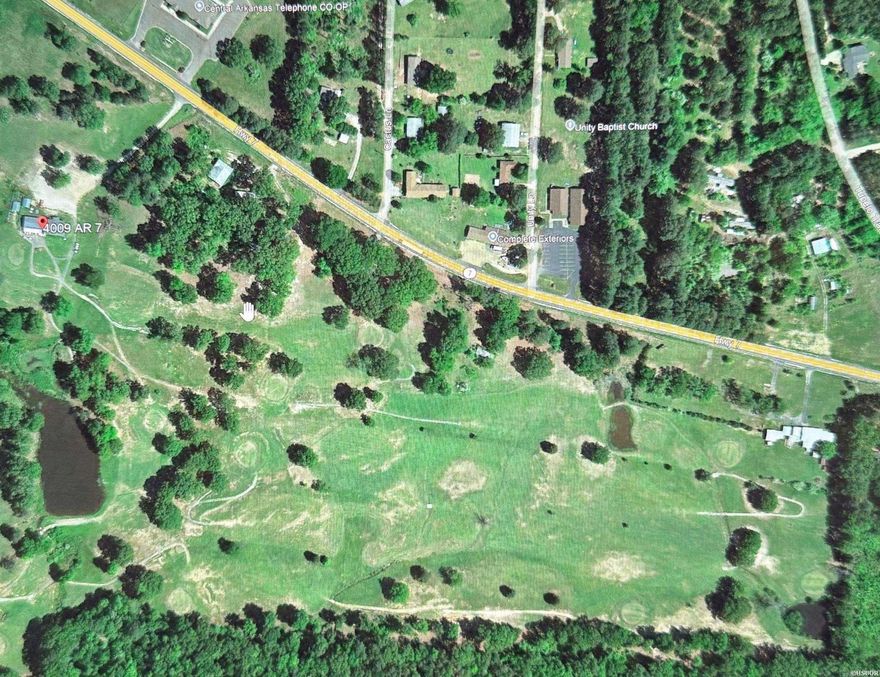 Discover an exceptional 42-acre property, formerly the Caddo Creek Golf Club, offering outstanding redevelopment potential. Operated as a 9-hole golf course for decades before closing in 2019, this scenic property is perfectly positioned just 2 miles from DeGray Lake State Park and 15 miles from Hot Springs, with quick access to Interstate 30. With three picturesque ponds and a 2,500 sq. ft. former pro shop building featuring ample parking, this property is primed for a variety of possibilities. Whether you envision an RV park, golf course, driving range, or residential development, the location is ideal. Additionally, the adjoining property owner is developing a public pickleball facility, further enhancing the recreational appeal of the area. Don’t miss this rare opportunity to transform a historic piece of Bismarck into something extraordinary!