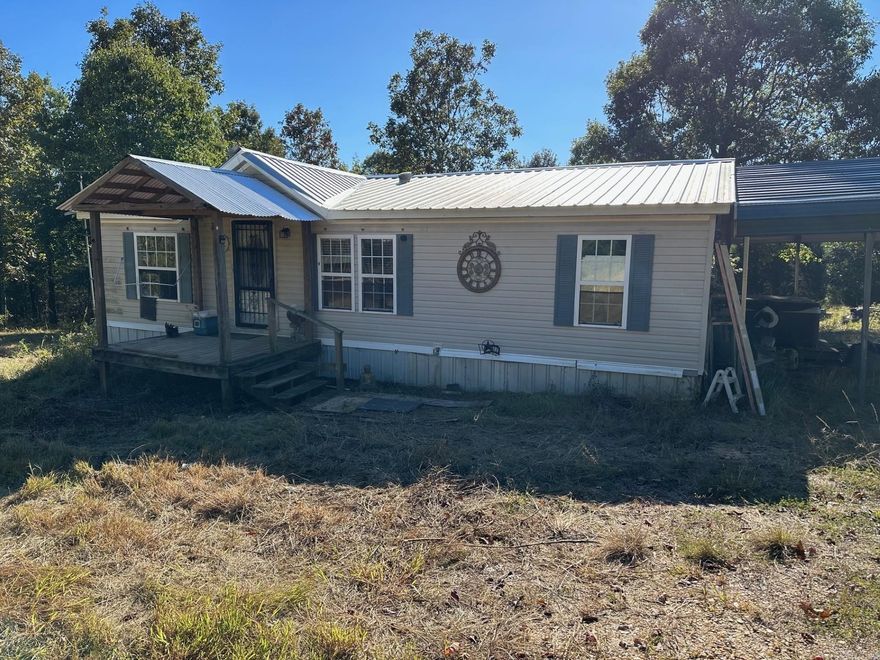 Over 63 acres with a 1120 sq ft mobile home.  There is a ton of wildlife.  There are multiple outbuildings as well.  There are several spots in which a house could be built.  There are 2 separate septic systems.  This property would be great for a family estate.