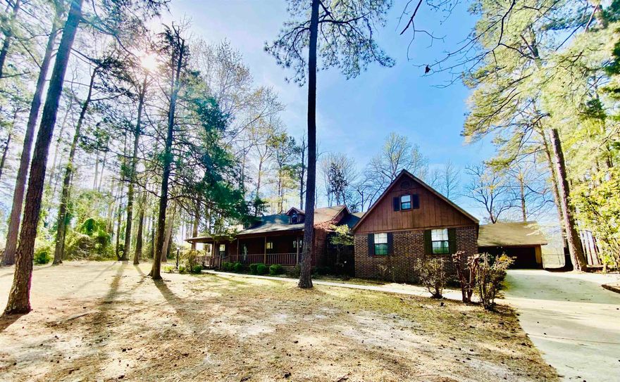 This 3 bed/3 bath home in the Southwood area has all the country amenities. Sitting right outside city limits, you’ll find privacy and comfort as you enjoy the wooded outdoors on the back deck. The home features a spacious kitchen with with an island and dining area, family room with gas logs, and a personal office. There is a separate family room and an upstairs bonus room, perfect for a playroom or an extra bedroom. The detached 2 car garage includes extra storage.   This property is being sold “as is, where is” No seller property disclosure is available.