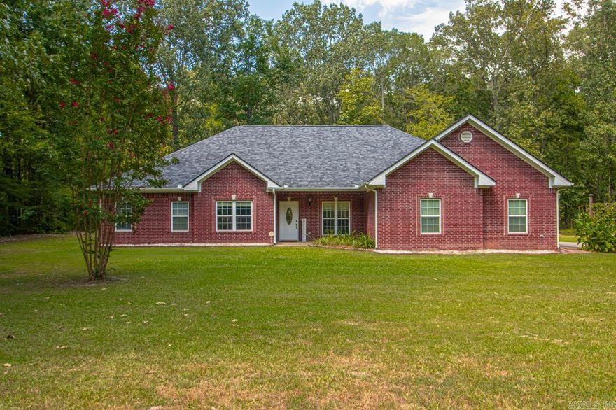 This beautiful brick home is a must-see! Nestled on 2.6 acres surrounded by mature trees, it offers the perfect blend of privacy and comfort. Featuring 3 spacious bedrooms, 2.5 bathrooms, plus an office (or optional 4th bedroom), this home is designed with a desirable split floor plan. The formal dining room sets the stage for family gatherings and dinner parties, while the screened-in back porch provides a peaceful spot to enjoy your morning coffee. A 3-car garage adds convenience and extra storage and shed in backyard. Updates include a new roof (August 2023), new Carrier AC (2024), and fresh interior paint (2025).