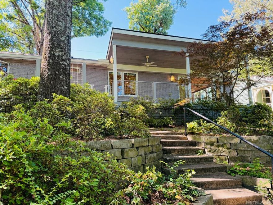 Discover the perfect blend of modern efficiency and serene parkside living in this stunning, 2016 total renovation. No detail was overlooked during its transformation, which featured a complete overhaul of the electrical, plumbing, HVAC, roof, and windows, along with the addition of on-demand hot water for ultimate comfort. Inside, the home boasts an airy open-concept layout defined by soaring vaulted ceilings, a cozy fireplace, and custom built-ins, all designed with a meticulous eye for detail that ensures zero wasted space.  Step outside to your private front deck to take in gorgeous, unobstructed views of Allsopp Park, providing a peaceful sanctuary in a quiet neighborhood setting. Complete with a garage for ample storage and a covered parking space, this home offers the rare opportunity to enjoy a "like-new" interior with an established, picturesque backdrop.
