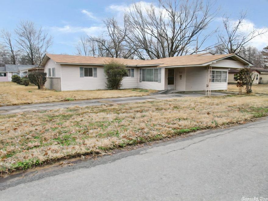 Nice house on a corner lot. Large living room, sunroom, carport, and outside storage. Galley style kitchen with room for a breakfast table. Large yard for relaxing in the evenings. This one won't last long.