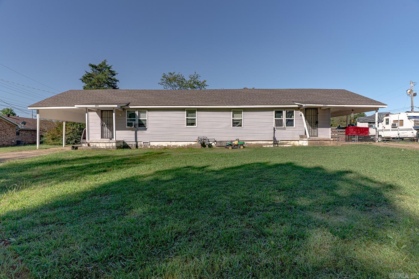Investor Special – Duplex Investment Opportunity! Welcome to 605 & 607 Alfred Watkins St in Jonesboro, a duplex featuring two 2-bedroom, 1-bath units. Both units are tenant-occupied, making this a great addition to any income-producing portfolio. Tenants pay all utilities except water, which averages $30–$50 per month, keeping the property low-maintenance and easy to manage. Each unit offers a functional layout and durable finishes, providing steady rental income in a desirable area with consistent tenant demand. Conveniently located near schools, shopping, and major highways, this duplex is ideal for investors seeking reliable returns and long-term stability. This property is part of a large investment portfolio between West Memphis and Jonesboro, AR. The seller prefers to sell the portfolio in full but may consider smaller packages after a few weeks if no full-package offers are received. Contact agent for rent rolls, lease details, and full package information.