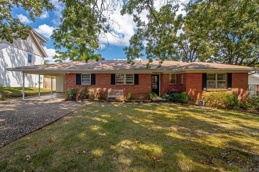 Wonderful opportunity in the highly sought after Pine Manor neighborhood with this all brick 3 bed, 1.5 home.  Kitchen taken to the studs in 2019 and updated with custom cabinets, quartz counters, and a Thermador 6-burner gas range. Enjoy multiple living areas, hardwood floors, wood burning fireplace, deck, and fully fenced yard.  Single-car carport and extra wide driveway allows for plenty of parking for owner and guests.  Zoned for Forest Park Elementary, this home is a must-see!