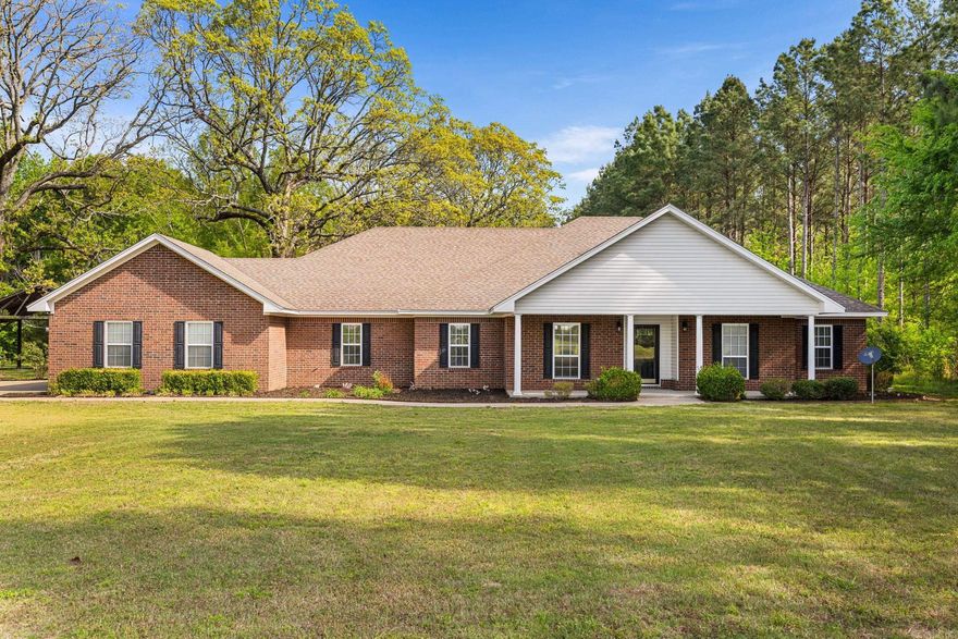 Amazing opportunity to own a beautiful house on 10 acres in Cabot School District!  This home has been well maintained, offers 3 bedrooms, 2.5 baths, formal dining room, laundry room, extra room for mud room/office, a gorgeous kitchen, a 3 car garage and safe room!  The living room is open to the kitchen, has a gas fireplace and pretty coffered ceiling.  The kitchen has an island, plus a breakfast bar, tons of cabinets and countertop space, stainless appliances & refrigerator stays, 2 pantries, gas cooktop, granite. The large master suite is separate from the guest bedrooms, has tray ceiling, walk in closets.  Master bathroom has dual vanities, separate tub and walk in shower.  Guest bedrooms are spacious, also with wood flooring (no carpet in house). Sunroom!  Enjoy the outdoors with 10 acres, part wooded and partly cleared.  Old dairy barn makes for great storage! Barbed wire fencing around the sides and back, large fenced in area for pets.  Great set up that offers plenty of space for all activities.