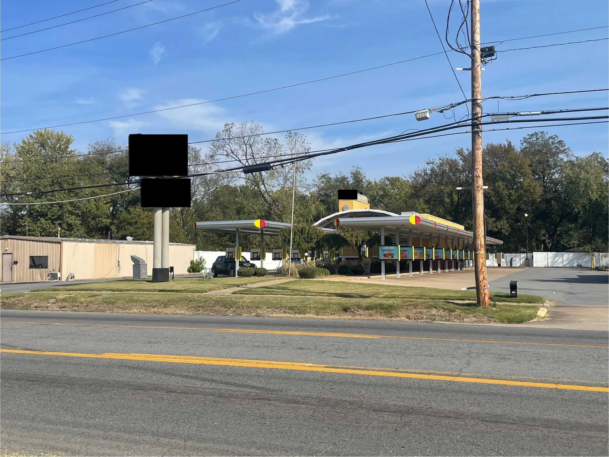 Prime Commercial Opportunity: Drive-In Restaurant Building with Office Space Unlock the potential of this Drive-In, located in a high-traffic area with excellent visibility. This unique commercial property offers an expansive drive-thru setup, existing kitchen space, and a built-in office area, ideal for managing business operations on-site. Key Features: • Lot Size: Generous space for parking, drive-thru lanes, and outdoor seating area. • Office Area: A private office is included within the property, perfect for administrative use or storage. • Utilities: Basic utilities are available and can be adapted to meet your business needs. • Location: Strategically positioned in a busy area, maximizing customer exposure and accessibility. With a bit of vision, this versatile space could serve as a revitalized restaurant, coffee shop, retail space, or office building. Whether you're looking to continue in the food industry or transform it for another purpose, this property offers unmatched flexibility.