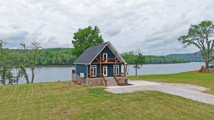 Built in 2024, this like-new 3-bedroom, 2-bathroom riverfront home offers approximately 1,794 square feet of living space on the banks of the White River, with all paved road access and a drive of less than twenty minutes to Batesville, Arkansas. The main living areas and many of the windows face toward the river, allowing the living room to function as primary viewpoints for the water, iconic bluffs, and surrounding landscape.  A dedicated laundry room adds everyday convenience, and includes a move-in ready appliance package in the kitchen. Outdoor living is a key feature, with the back deck positioned to overlook the White River. There is abundant wildlife that can be seen regularly from the property, such as bald eagles, river otters, beavers, ducks, geese, and deer along the river corridor.  The river setting supports a range of recreational activities, including bank and boat fishing, kayaking, canoeing, and leisure boating on nearby stretches of water, making the property suitable for owners seeking both a residence and an outdoor-oriented lifestyle. This 0.6 acre river lot and home is listed for only $385,000.