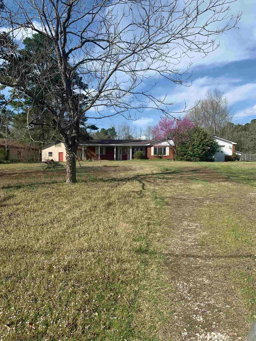 4 bedroom, 2 bath with shop. Tons of potential. All offers for this property must be submitted by the buyers' agent via Hubzu.com.  Home will be sold AS-IS