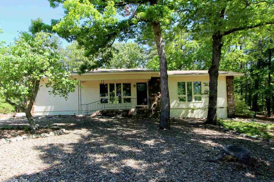 Beautiful home on a corner lot. Very level! Vinyl sided. 2 car garage.. Such a private setting. Vaulted living room. Wood burning fireplace with Buck stove. Very low maintenance yard. Very convenient location to Coronado Center and Glazier Peau gate. Well maintained. Directions: From west gate, DeSoto Blvd to Balearic (R) to Monterrey Rd (R) to Pyrenees Way (R)  to the corner of Pyrenees Way and Guadal Lane (on your right)