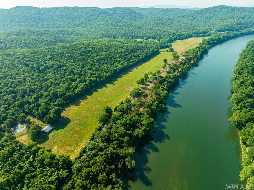 Hitting the market today is this INCREDIBLE 316 +/- Acre White River Frontage Property!!  Yes, this property has about a half mile of White River Frontage!!  This frontage has been cleared off and is ready for you to put your dream cabin on!  This property sets just outside of Melbourne in a town called Boswell, off Highway 9.  When you turn onto this road, you will come down a drive covered with trees, winding down and breathtaking. Then when you get to the end, it will open up to pasture that will be a fantastic view because you are then overlooking the White River!  This property has a mixture of woods, an excellent cave for the adventurous person, lots of trails for ATVs or hiking, pasture for cattle or horses, and a barn with a well and electricity!  Yes, with ELECTRICTY and WATER, you are ready to build that dream home!!!  It would be a great place to build a forever home and overlook the White River, have your pasture for your livestock, woods for hunting, and the river for recreation!  All of this wrapped up into one piece!