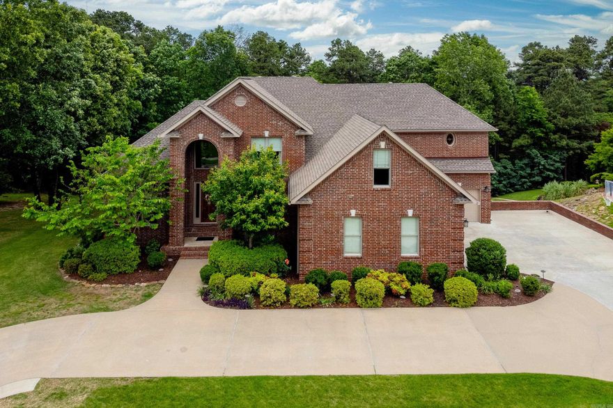 Spacious and beautifully appointed, this stunning home offers room for everyone and storage galore! The main level features a luxurious primary suite with a sitting area, two walk-in closets, and a spa like bath, plus a private guest en-suite ideal for visitors. Enjoy both formal living and dining rooms, along with a cozy den featuring a double sided gas fireplace that opens into the informal dining area and kitchen. The fantastic kitchen includes custom cabinetry, stainless appliances and ample workspace. A convenient half bath and laundry room complete the main floor. Upstairs, you’ll find a generous family room, a huge guest en-suite, two additional bedrooms, a full bath plus bonus room currently used as an office. The lower level offers even more living space with a game room, additional bedroom and full bath, perfect for a teen suite or in-law setup. Outdoor living shines with multilevel decks, a stone patio with a fire pit, and a large, beautifully landscaped lot. Additional features include a 3-car garage, attic storage, and under-house storage. Come see!