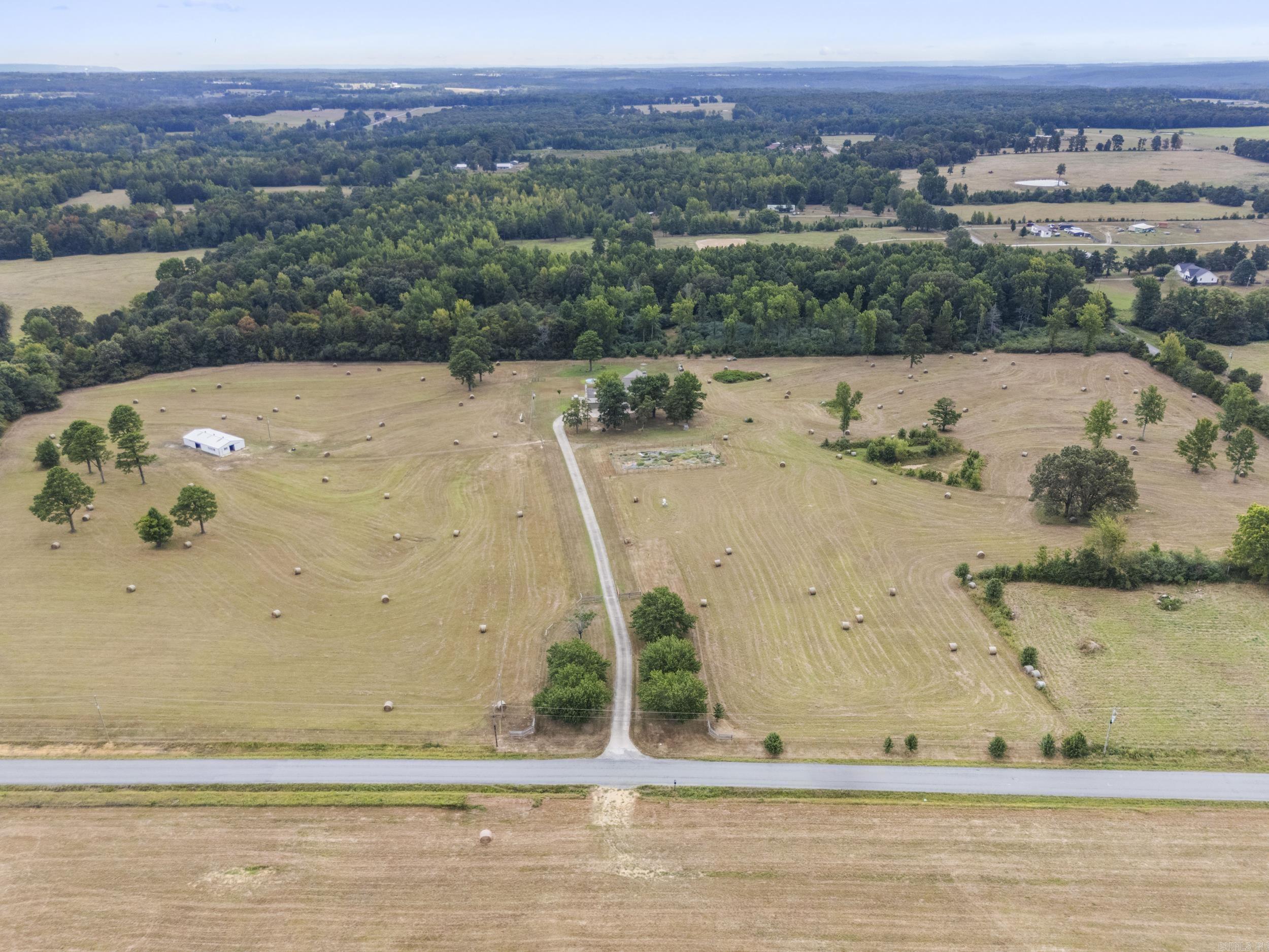 Welcome to this amazing property nestled over 41+acres. Experience private pastures surrounded by nature & abundant wildlife. With 4320 sq ft, 3 oversized bedrooms, 2 1/2 baths & huge bonus upstairs w/ fireplace (which could easily be 4th bedroom). Entertainment size great room w/fireplace features soaring ceilings and large windows that flood the space with natural light throughout the home. A chef's dream kitchen with double ovens, 6 burner gas stove, plenty of cabinetry, counter space and large island. Separate laundry area. In-house basement storage area. Many updates, new paint and updated baths. Property is fenced, 6 stall barn, hay storage pad & storage room,RV pad and electric/dump hook ups, wet weather creek in the forest, working well with new pump, apple and peach trees and fenced garden area. Whether you are looking for privacy or looking for a small farm, don't miss out on this incredible opportunity this property has to offer. SEE AGENT REMARKS!
