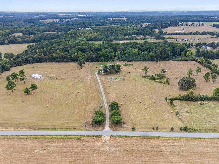 Welcome to this amazing property nestled over 41+acres. Experience private pastures surrounded by nature & abundant wildlife. With 4320 sq ft, 3 oversized bedrooms, 2 1/2 baths & huge bonus upstairs w/ fireplace (which could easily be 4th bedroom). Entertainment size great room w/fireplace features soaring ceilings and large windows that flood the space with natural light throughout the home. A chef's dream kitchen with double ovens, 6 burner gas stove, plenty of cabinetry, counter space and large island. Separate laundry area. In-house basement storage area. Many updates, new paint and updated baths. Property is fenced, 6 stall barn, hay storage pad & storage room,RV pad and electric/dump hook ups,  wet weather creek in the forest, working well with new pump, apple and peach trees and fenced garden area. Whether you are looking for privacy or looking for a small farm, don't miss out on this incredible opportunity this property has to offer. SEE AGENT REMARKS!