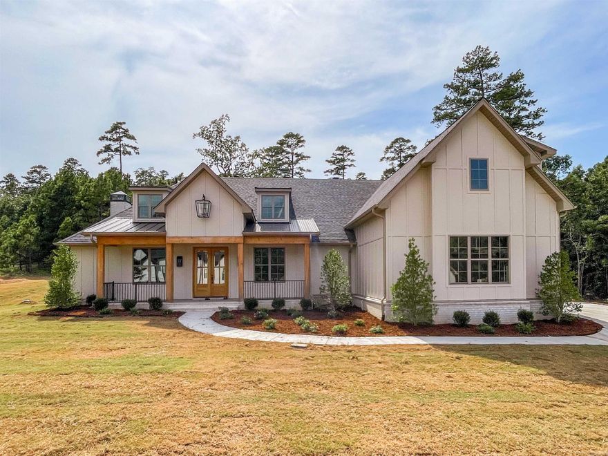 .5 Acre lot with 115' of road frontage, backing up to 7.5 acre tract of permanent wooded greenspace, home faces East.  Open floorplan with large great room, dining, kitchen area-beautiful interior/exterior finishes on a half acre lot that backs up to a beautiful greenspace area.