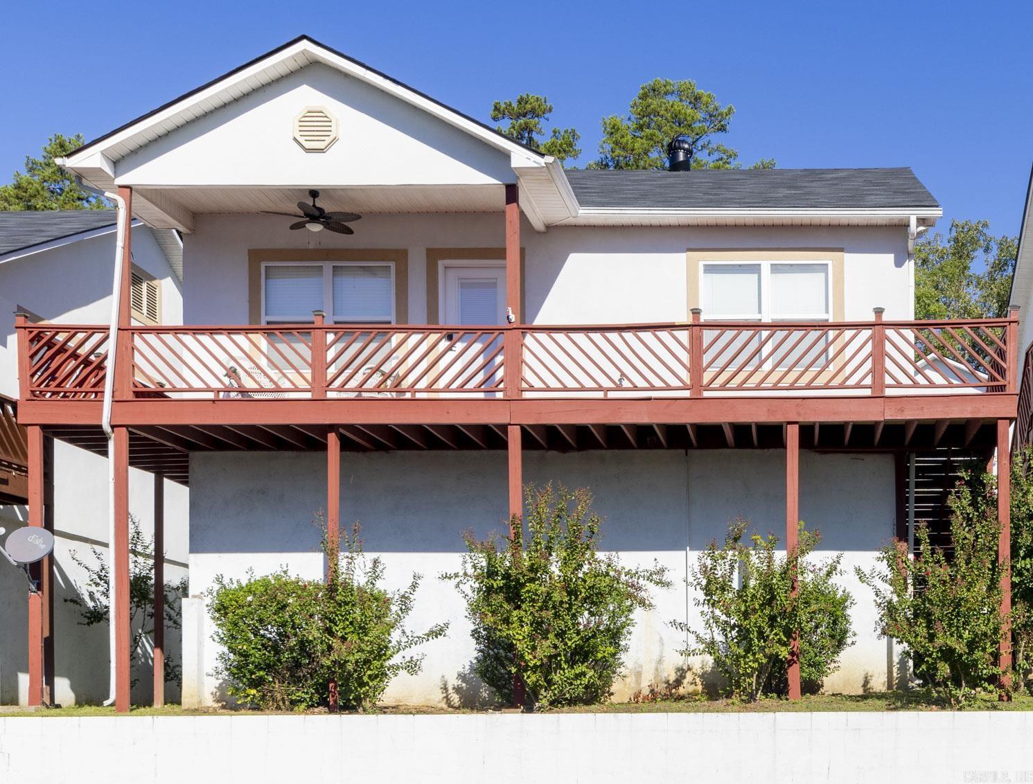 Hot Springs Lakefront Paradise - Fully Furnished 2 Bed, 2 Bath Stand-Alone Condo with Garages and a Boat Slip Discover the epitome of lakeside living in this fully furnished condo, ideally located in Hot Springs, Arkansas, on the serene shores of Lake Hamilton. With two garages for your car and boat, this property is a haven for those who appreciate both convenience and leisure. Whether you choose to make it your own private oasis or a week-end get-away, this condo offers direct access to the lake, where you can indulge in water sports, swimming, and boating, all within steps of your door. Enjoy sunsets and tranquil moments on your private lakefront deck. In addition, this condo offers the best of lakefront living with proximity to Oaklawn Horse Racing and Casino, shopping, and dining. In addition to the two garages, this condo comes with a boat slip. This fully furnished stand-alone condo on Lake Hamilton is your gateway to a life of relaxation, leisure, and adventure. Whether you're in the market for a year-round residence or a vacation escape, this property has it all.