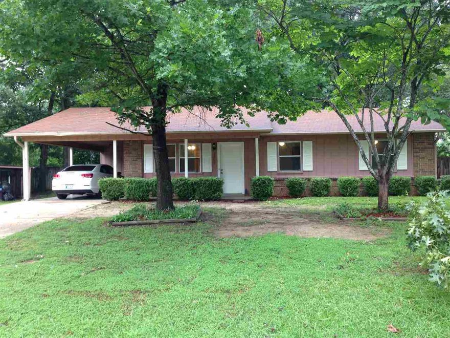 Cute home in a great neighborhood! 3 bedroom 1.5 bath. Located in a cul-de-sac, nice large back and side yard. Lots of shade trees! 2 storage buildings on lot. Large carport area. All new paint inside. Laminate wood floors in living room and hallway. Qualifies for RD Loan!! Would be a great starter home or investment property! See Agent Remarks...