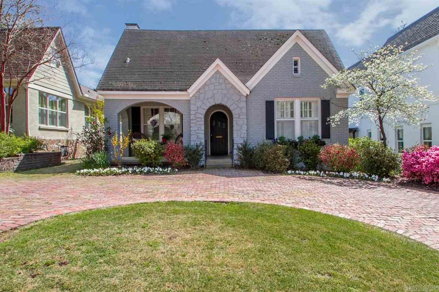 Classic Prospect Terrace charm w/3BRs & 2.5 BAs. Circular brick drive, covered front porch w/arched openings, stone front entrance. Main level- LR w/gas FP, open to DR, the kitchen w/stainless appliances, solid surface counters, island, & open to breakfast room. Powder room & laundry off kitchen. 2 BRs and nice bath, whirlpool tub, & separate shower. Spacious master upstairs w/2 large custom closets, master bath, & finished attic space. See agent remarks.