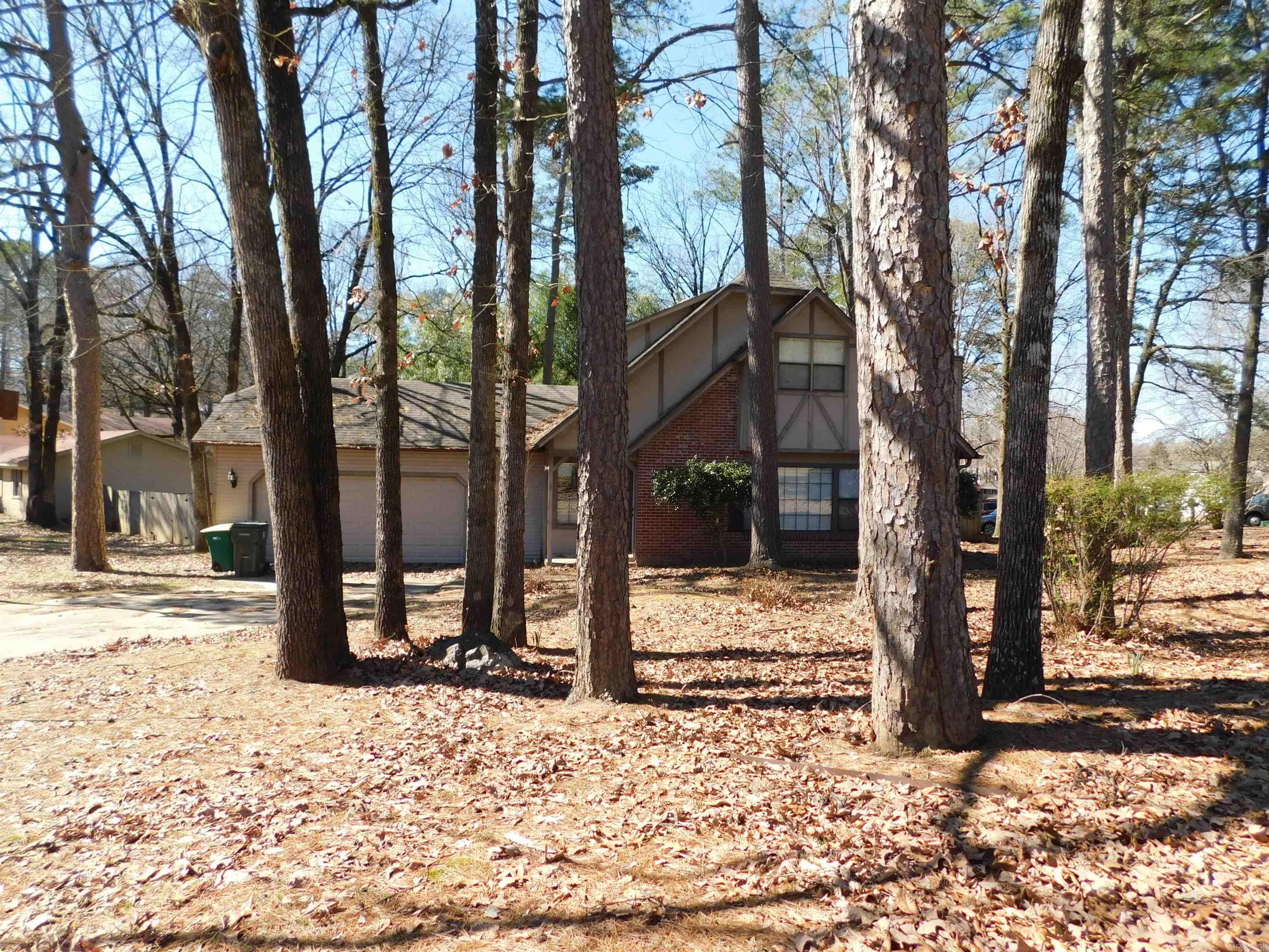 Wonderful neighborhood with nearby shopping, dining, schools, hospital & entertainment! Super nice 3 bedroom, 2 bath 2-story home on a quiet corner lot. This home is nicely painted w/hard surface floors in common areas. Eat-in kitchen furnished w/stainless steel appliances, stone countertops, new tile backsplash, plenty of storage, a deep pantry & large laundry room off kitchen. Living room w/fireplace and master bedroom/bath on lower level. Two bedrooms upstairs w/shared bath. HVAC & ceiling fans. Double car garage with work bench & extra storage. Large, fenced back yard with deck & brick patio.