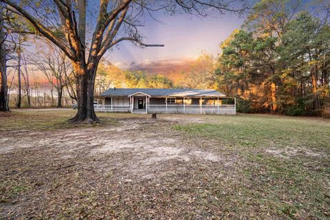 Photo of 228 Old Mill Rd Rd, Junction City, AR 71749 (MLS # 25049710)