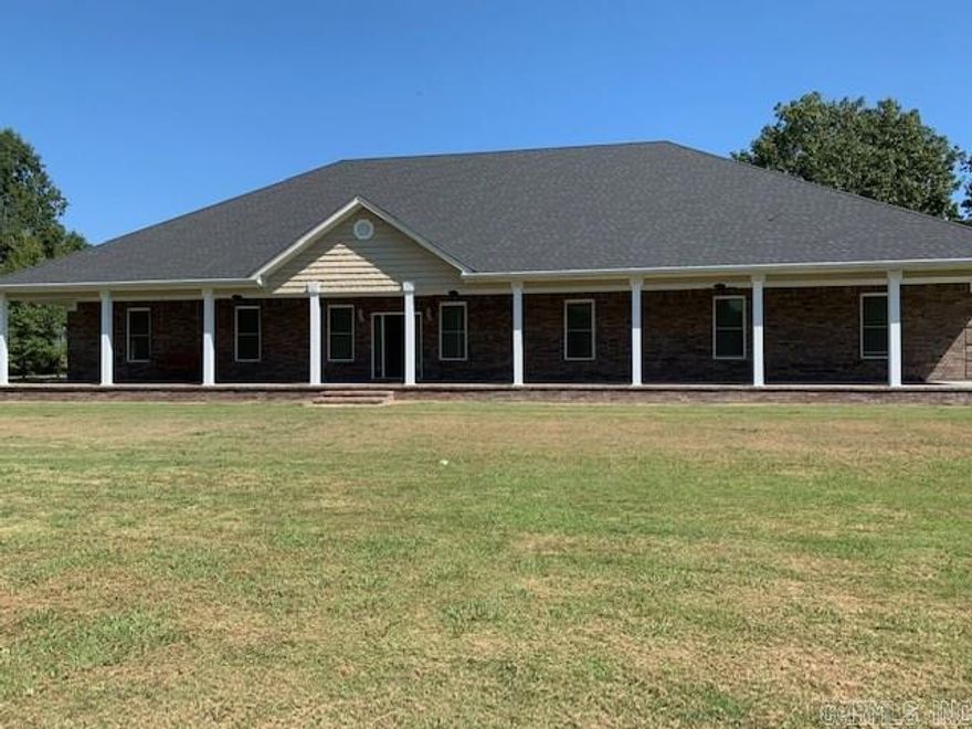 SBL! Custom built home with large wide front porch sitting on 5 acres. Greatroom, dining area & kitchen all open w/high ceiling, lots of crown molding, and beautiful tile floors, granite countertops, & breakfast bar. 3BR, 2 BA, unfinished bonus room & bath off the garage. Patio on the back to enjoy the beautiful above ground pool. Extra insulation thru out.