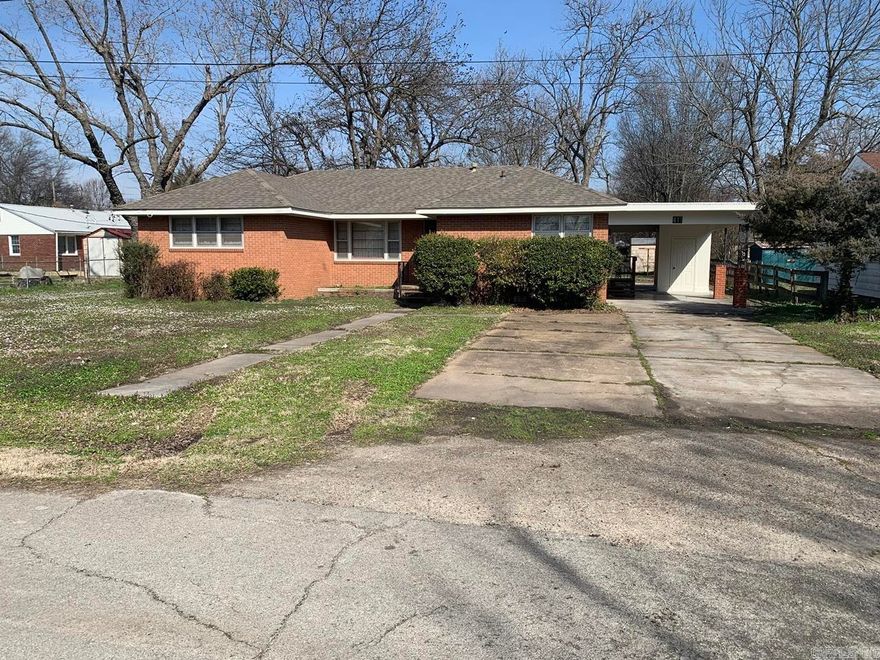 This home is just waiting for someone to scoop it up and make it their own! Put your own personality into it with some updating! The seller has started the ball rolling with a new roof and new exterior paint. There are 3 bedrooms, 2 baths, 2 living areas - one of which can be made into a 4th bedroom. Nice large yard with pecan trees. Single car carport with a double parking pad. Call today!