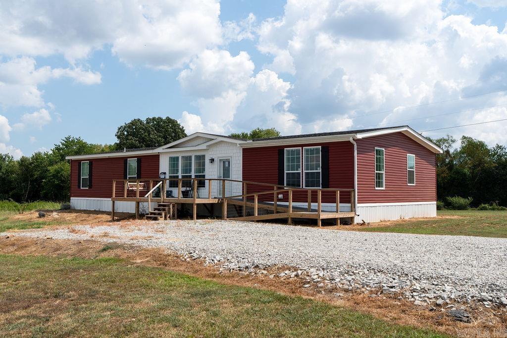 135± acres just outside Quitman city limits, offering endless possibilities for recreation, farming, or investment. This beautiful property includes a brand new 4-bedroom, 3-bath manufactured home with an open floor plan, two ponds, a barn, and partial fencing. Two producing gas wells and mineral rights convey with the sale. Enjoy wide open spaces with a mix of cleared and wooded land, perfect for livestock, outdoor activities, or future development. Located right next to the Quitman ballpark, this property offers a rare combination of privacy, convenience, and room to grow. With stunning views, modern living, and plenty of acreage, itās ready for your next chapter.