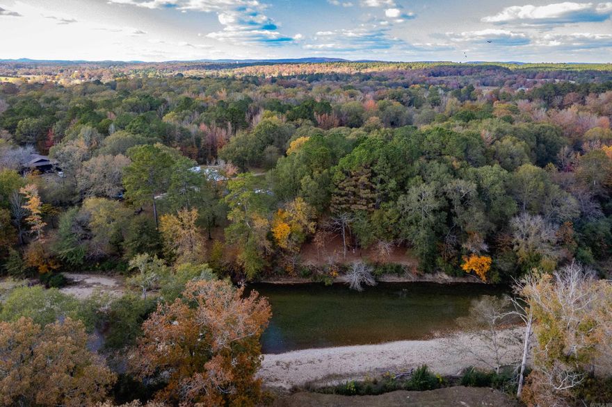 Dreaming of a quiet place to relax at the end of the day? Escape to 5 acres of serene waterfront living on Mazarn Creek. With 165 feet of water frontage, this property is ready for your custom home—or for a great rental that offers guests the joy of kayaking and canoeing from their own backyard. Peace, privacy, and natural beauty are waiting. Make it yours!