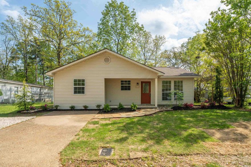 This Darling Home in the Lake Hamilton Area has been Completely Restored and is Ready for New Owners!  Featuring an Open Floor Plan and a Gorgeous Kitchen complete with New Cabinetry, Quartz Countertops, a Butcher Block Island, and Stainless Steel Appliances.  Enjoy Spacious Bedrooms and Nice Closets.  The Laundry Room / Mudroom leads out to the Back Patio and Fenced Back Yard.  Enjoy Lake Access to Lake Hamilton and the Neighborhood Park/Picnic Area for a Nominal Annual Fee. *The Front Porch will have Flagstone Pavers to match the Sidewalk as soon as weather permits.  Call Today to Schedule a Showing!  This Property Qualifies for 100% financing through the Rural Development Loan.
