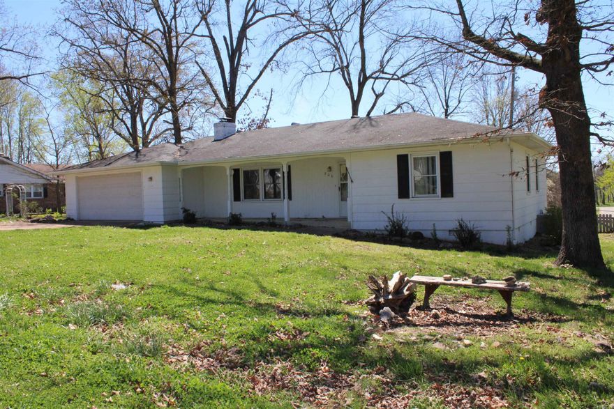 CHECK THIS SWEET DEAL OUT! This two-bedroom home is sitting on a nice lot in Mountain Home. Centrally located and minutes from shopping, medical, schools and employment. Fenced back yard, large living room with fireplace, plenty of cabinets in kitchen and an attached garage! Property is waiting for you to come make it your own! Sold as is.