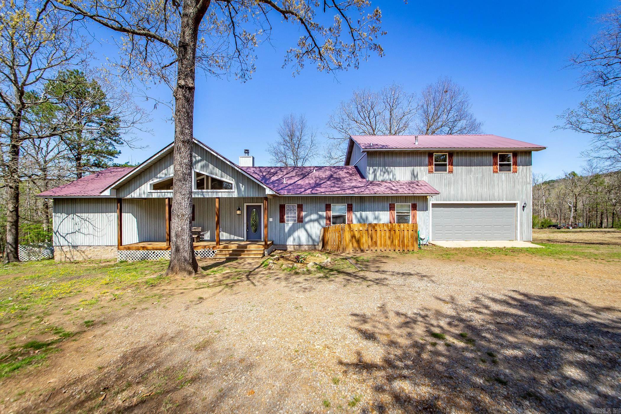 I am excited to share a property that offers both unique features and incredible potential. This home is located on Greers Ferry lake and includes a private 1 stall Boat Dock!! One of the standout features of this property is its gentle slope to the water, marked by a low white line.This makes for an easy walk to the lake. There's a 12 X 30 utility building with an attached lean-to, Providing ample storage or a workshop space. 1.46 acres M/L of land that gives you privacy. There is a boat ramp with parking just a few minutes away.