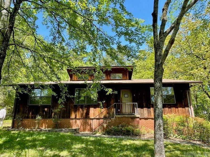 Onel level frame cedar style home nestled on acreage with highway frontage and conveniently located on Malvern Ave. Home features 2 bedrooms, 2 full bathrooms, central heat, central cool, fireplace, front open porch and rear glass enclosed porch, partial basement and attached 2 car garage. HUD Case #031-412090, FHA Financing: IN (Insured). Property is sold in as-is condition, no warranties, guarantees or representations.