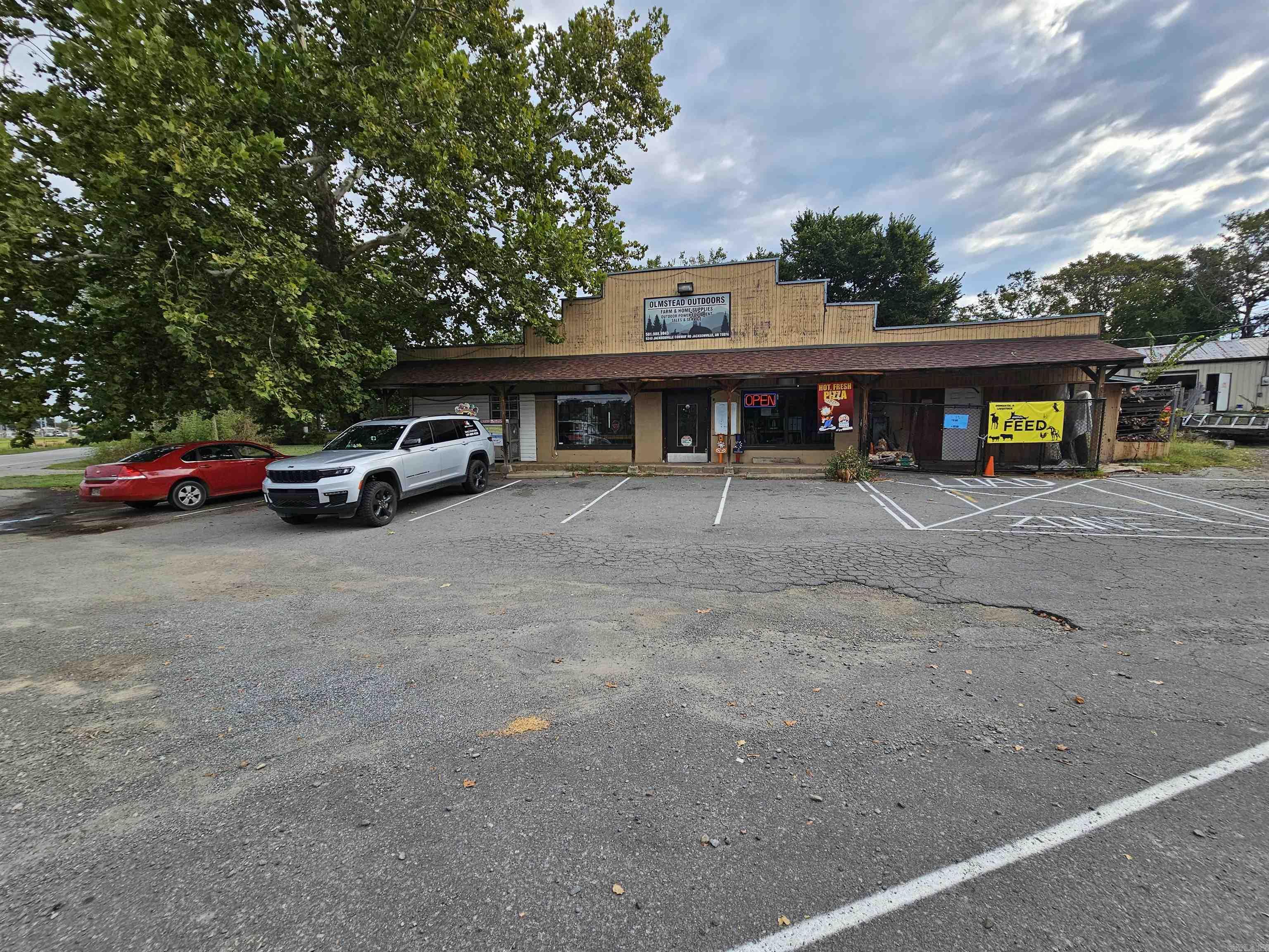 If you are looking for a great opportunity to continue an established business that has been in the community for 40+ plus years, this is your opportunity. Olmstead has been a country store for many of years and presents great opportunities in the 4800 sq ft building currently operating as a feed and hardware store. There is a fully functioning kitchen to serve and bake the best food around town. There is a functioning 2700 sq ft lawn shop with an additional 3600 sq ft building to make into your very own. The Lawn shop is set up for gas pumps but currently not in use. Tanks are still in the ground and have been tested. Dont let this opportunity pass you by to continue great opportunity within the community.