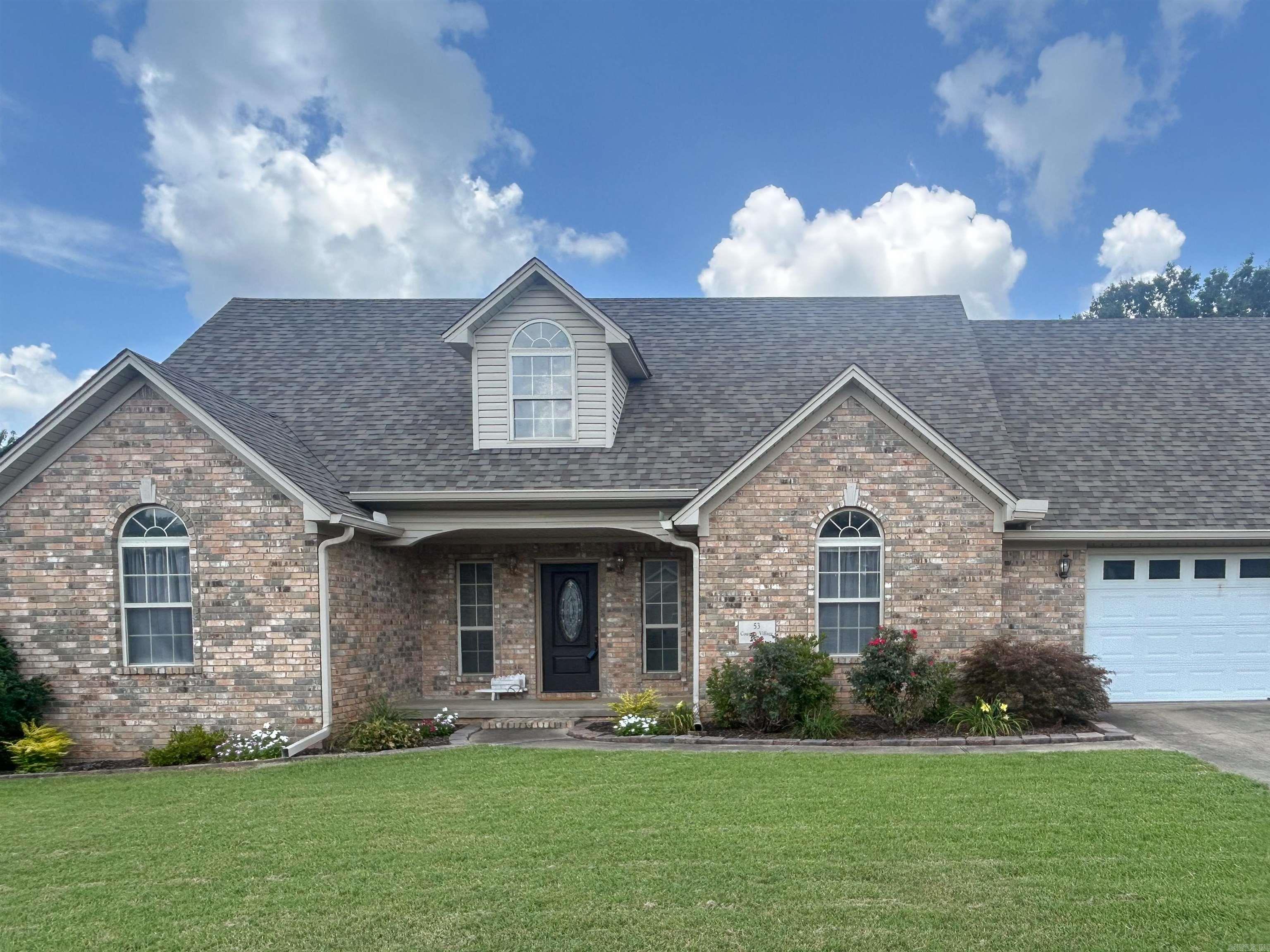 Pride of ownership is evident in this ONE OWNER HOME at 53 Country Village Circle nestled in quiet Country Village Estates! This stunning 3-bedroom, 2-bathroom property features a split floor plan downstairs and is complete with a massive bonus room upstairs! The beautifully renovated kitchen...with new appliances, new countertops, new back splash, new lighting & fixtures...is perfect for entertaining. The wood tile floors add a touch of charm and durability. Newer roof!!!! The large fully-fenced backyard creates the perfect opportunity to enjoy the sunshine! Located in the heart of Cabot, you're only minutes from fantastic schools, dining, sports venues and shopping. With space, style, and an unbeatable location!!! BRAND NEW BACKYARD PRIVACY FENCE COMING!!!!