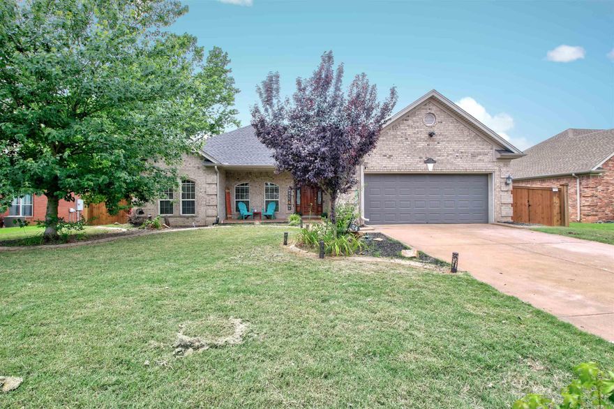 Discover this beautiful 3-bedroom, 2-bath home with a spacious living room featuring large windows for plenty of natural light. A double-sided fireplace connects the living room to the dining room. The master suite boasts a wrap-around walk-in closet. The split floorplan offers privacy, and additional bedrooms are generously sized. Enjoy the large covered back porch with deck added on, perfect for entertaining or peaceful relaxation. Modern amenities and a serene neighborhood location make this home a must-see. The roof is only 2 years old Seller is offering a $3000 flooring allowance. Schedule a viewing today