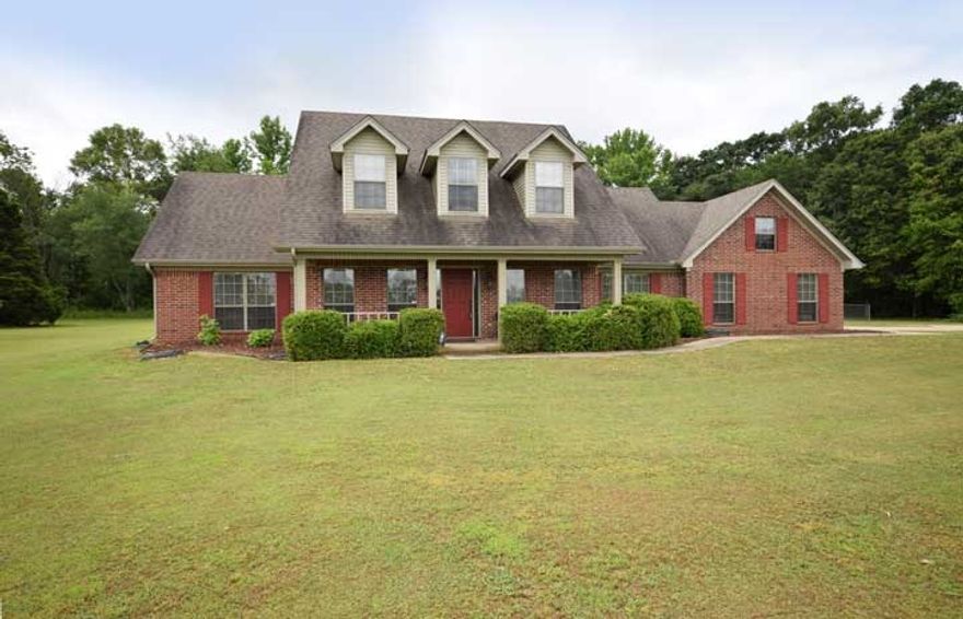 Lovely, very well maintained home located in a cul-de-sac.  Convenient to Vilonia Bypass and LRAFB.  Interior has vaulted ceiling in the living room. Large kitchen with island and lots of cabinets.  Plenty of closets and storage space.  One of the walk-in master closets was built as a safe room. Pan ceilings in master. Large chain-link dog pen conveys. Shop with overhead door and covered parking on the side. Beautiful acreage is partially cleared, partially wooded. Additional 1.87 ac across road available.