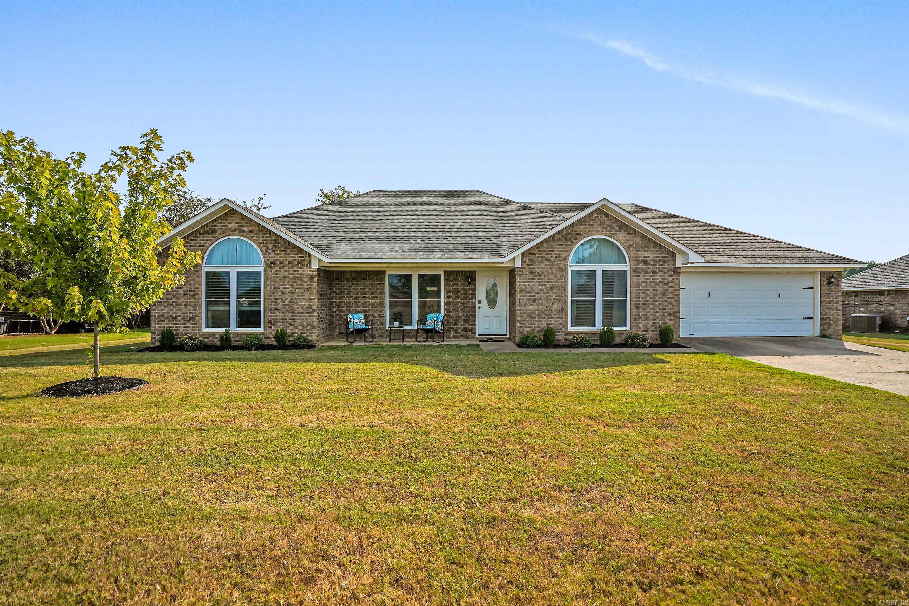 Welcome to this beautiful 4 bedroom, 2 bathroom home offering 1,932 sq ft of comfortable living space on a spacious ½ acre lot. The open-concept design creates a seamless flow between the living, dining, and kitchen areas—perfect for both everyday living and entertaining. With split bedrooms, the floorplan provides privacy for the primary suite, which serves as a peaceful retreat from the rest of the home. Recent updates include brand-new flooring and carpet, giving the home a fresh, move-in ready feel. The kitchen is open and functional, offering plenty of counter space and cabinetry for storage, while the living area features tall ceilings and plenty of space. And don't miss the office area tucked back past the laundry room. Outside, the expansive ½ acre lot provides endless opportunities—whether you’re dreaming of a garden, outdoor entertaining area, or simply extra space for kids and pets to enjoy. This home combines modern updates with a spacious layout, all in a desirable setting. Don’t miss your chance to make it yours!