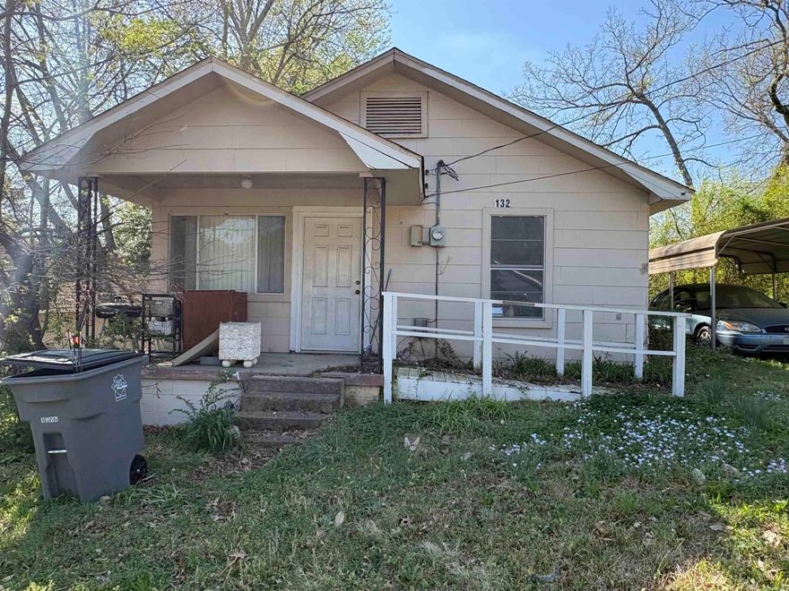 Located just off U.S. Highway 270 and minutes from Oaklawn Racing Casino Resort and CHI St. Vincent Hot Springs, this 2 bedroom, 1 bath property at 132 Hansford St offers excellent potential for rental income or a value-add project.  The property features a detached carport plus a detached 1-car garage with a small utility room equipped with electric and water—ideal for a workshop, storage, or additional functional space. An in-ground storm shelter adds an extra layer of appeal and practicality.  Situated in an established area with consistent rental demand, this home is well-suited for rental or renovation and resale strategy. The location near major employers and attractions strengthens its income-producing potential.  Property is being sold as-is, offering investors the opportunity to add value and maximize returns.  Don’t miss this chance to secure an affordable investment property in the growing Hot Springs market!   See Agent Remarks
