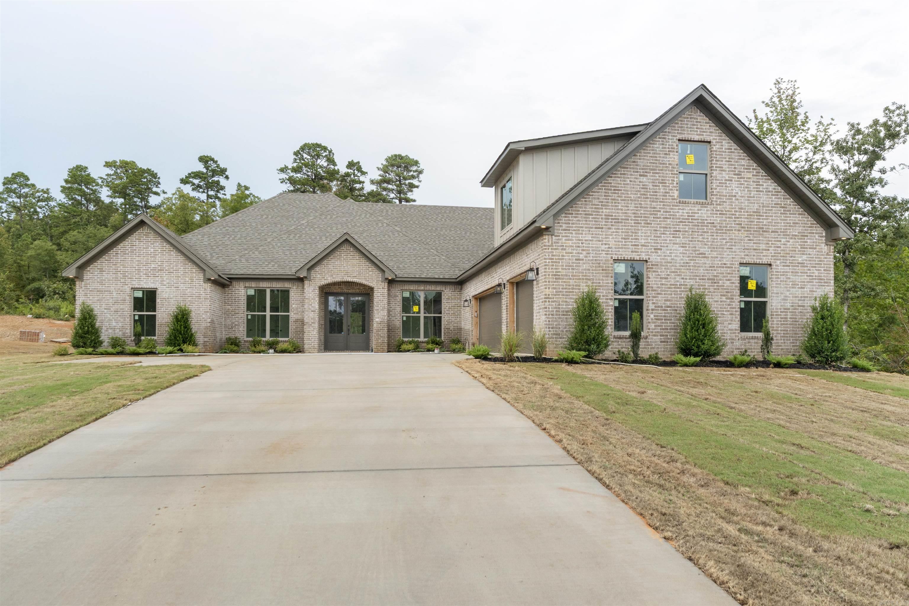 There is nothing not to love about this stunning new home. Located in the highly desirable gated Charleston Place development that is conveniently located in the Avilla community. This open plan includes gorgeous wood beams, centered fireplace and an unbelievable kitchen with quartz tops and chef's appliances. The spacious primary suite includes an incredible bath and closet space that leads directly into the laundry area. Generous sized guest suites, large bonus room and so much more. Agents see remarks.
