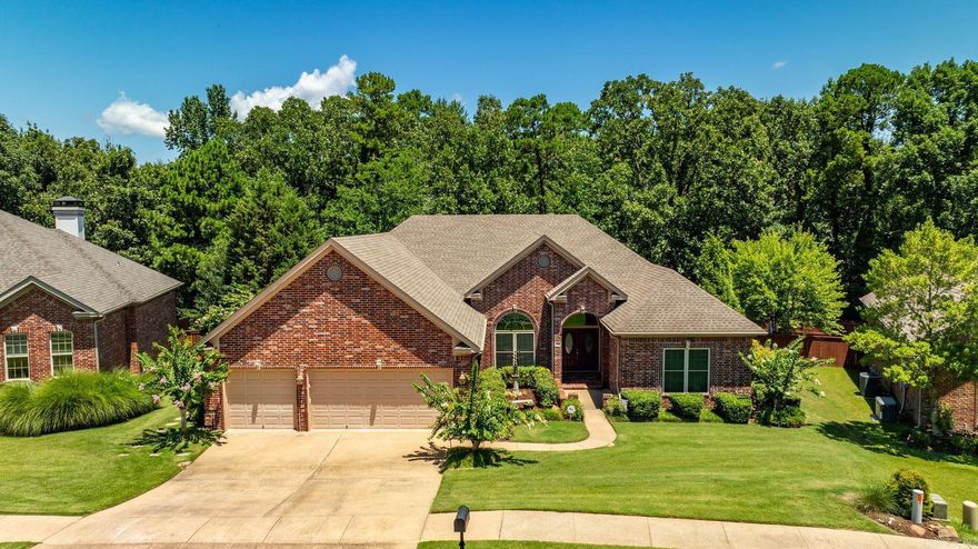 Beautiful & private, this one-level inviting Chenal home backs up to a deep & wide protected green space that wraps around the back of the home! The split floor plan, soaring ceilings, custom detail & spacious rooms create a feeling of space, light & luxury.  Great updates:  Roof 2017. Five Ton HVAC 2022. High Efficiency Windows 2021. HWH 2018. Luxury carpet 2024. Generator ready with gasoline generator conveying ensures power all the time.  The modern tornado/storm shelter in the garage lends peace of mind for storms. In addition to the investment in major systems, the owners have devoted meticulous attention to care of the home and the grounds.  The lush backyard & multi terrace entertaining areas will provide many years of al fresco dining & outdoor activities.The commitment to energy efficiency is evident throughout, with extra insulation installed and an efficiency audit conducted in 2021/2022, rating the home an impressive 96% energy efficient. This dedication not only reduces utility costs but also minimizes the home's environmental footprint.