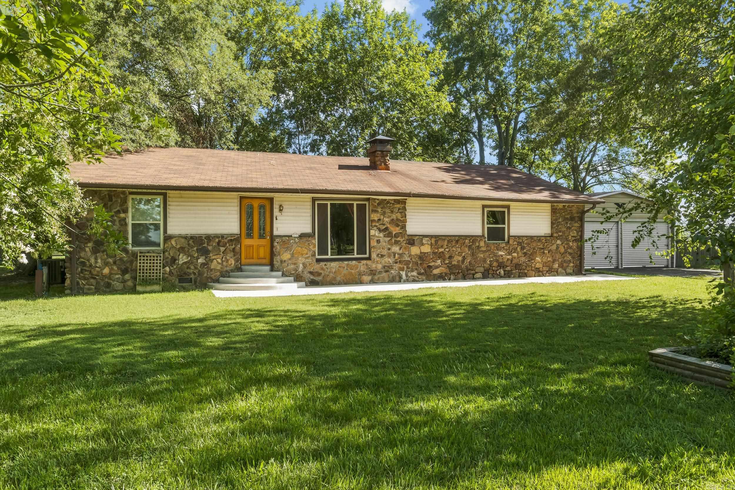 Escape to your own private retreat! This stunning 3-bedroom, 2-bath home on 20 acres offers everything you need: a gorgeous deck for unwinding, a spacious barn, two sparkling ponds, and a sunroom with A/C for year-round comfort. Plus, a dedicated office off the master bedroom makes working from home a breeze!