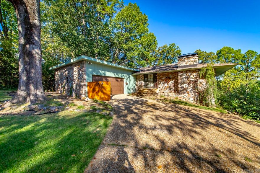 Check out this great buy in Leawood! This spacious home offers four large bedrooms and two and a half bathrooms with the primary on the main floor. You will love the large windows throughout, letting you enjoy the elevated views in the rear of the home. There is a large kitchen featuring granite counters, stainless steal appliances, including two refrigerators ensuring you never run out of space. This property is also on an oversized lot with a separate driveway and parking pad to the right of the home which allows easy access to the lower level. The backyard has a non-functioning in-ground pool and is the reason this listing is being sold as-is. Agents please see remarks.