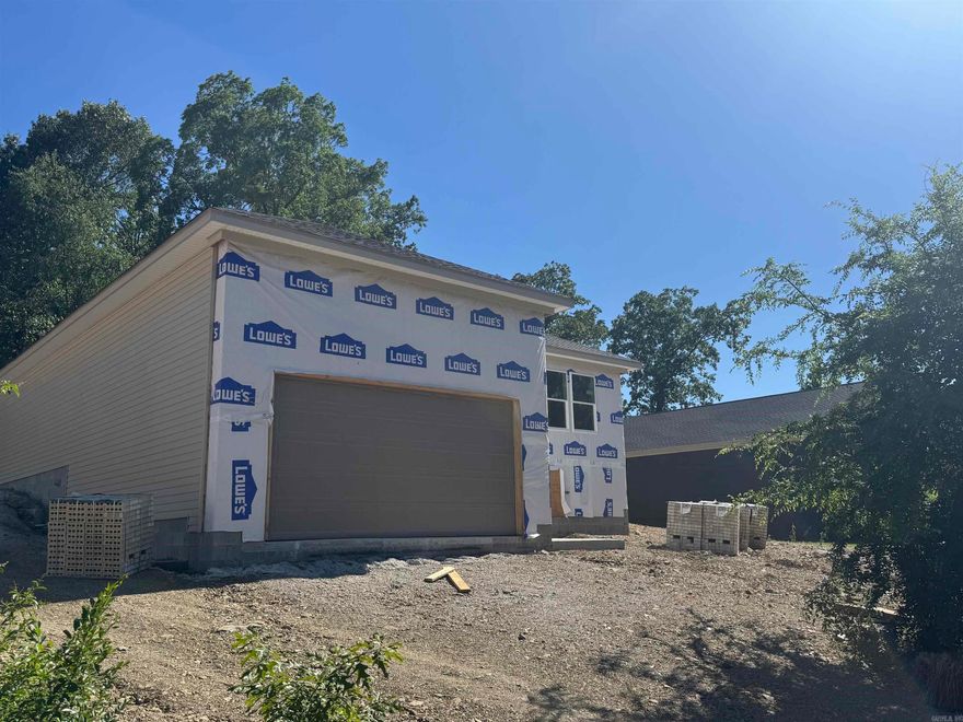 Brand New Construction in Hot Springs! Located at 312 Columbia Hills Street, this 3-bedroom, 2-bath home offers 1,600 sq ft of thoughtfully designed living space. The open-concept layout seamlessly connects the living, dining, and kitchen areas—perfect for everyday living and entertaining. The kitchen features modern finishes and ample storage. Additional highlights include a two-car garage, quality construction, and beautiful interior details throughout. Move-in ready and conveniently located—don’t miss this opportunity!
