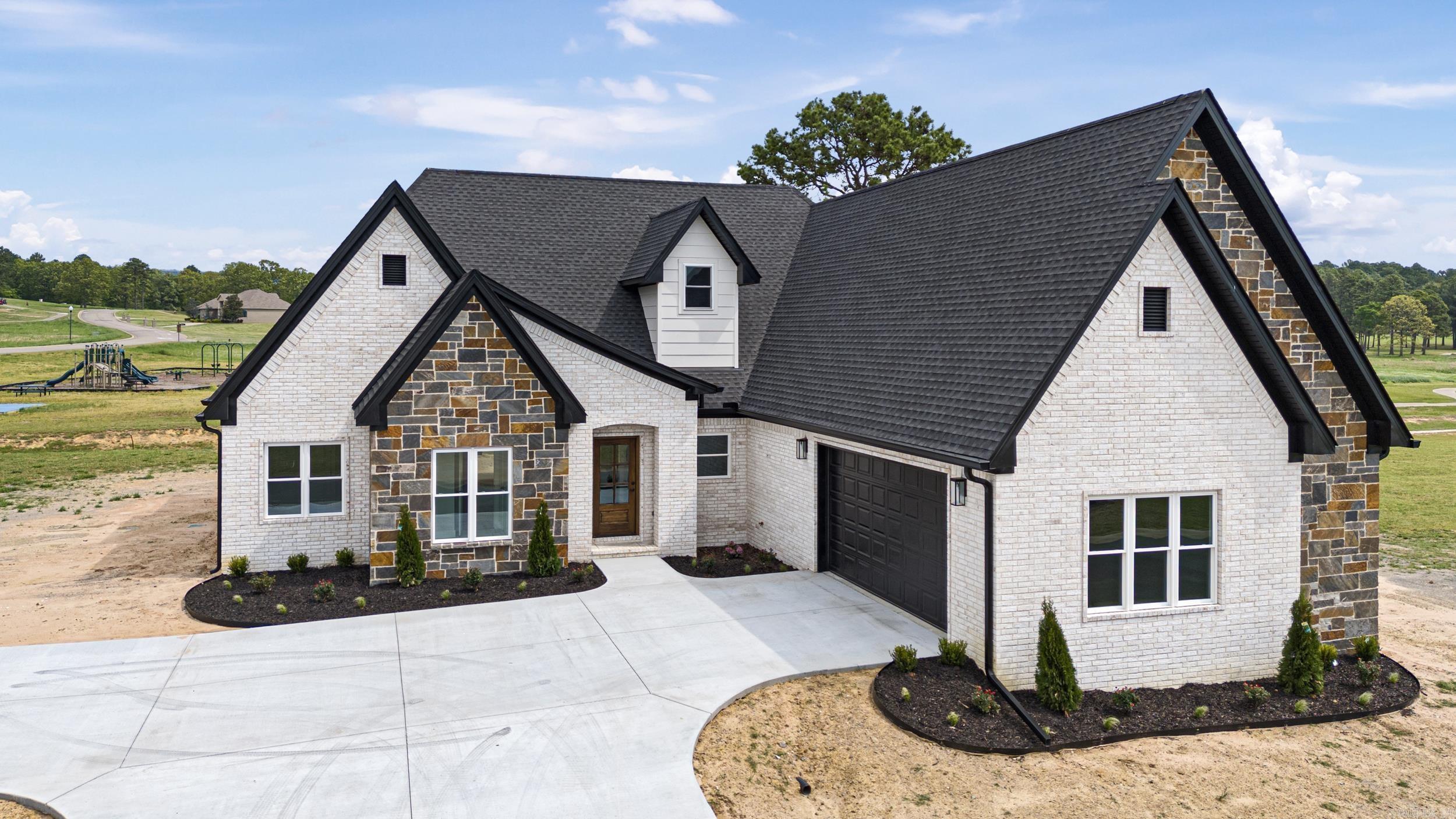 Welcome to your dream home on the prestigious Chamberlyne Golf Course! This brand-new build offers breathtaking golf course views and a lifestyle of comfort and elegance. Step inside to soaring cathedral ceilings that elevate the spacious open-concept living, dining, and kitchen areasāperfect for entertaining guests or enjoying quiet evenings at home. A cozy fireplace in the living room adds charm and warmth, creating the ideal retreat for chilly nights. The thoughtfully designed split floor plan features 3 spacious bedrooms and 2.5 baths, ensuring privacy and functionality for the whole family. Whether youāre sipping coffee on the back patio or hosting a weekend get-together, youāll love the resort-style feel of this beautiful home. Donāt miss your chance to experience luxury living on the greenāschedule your private tour today!