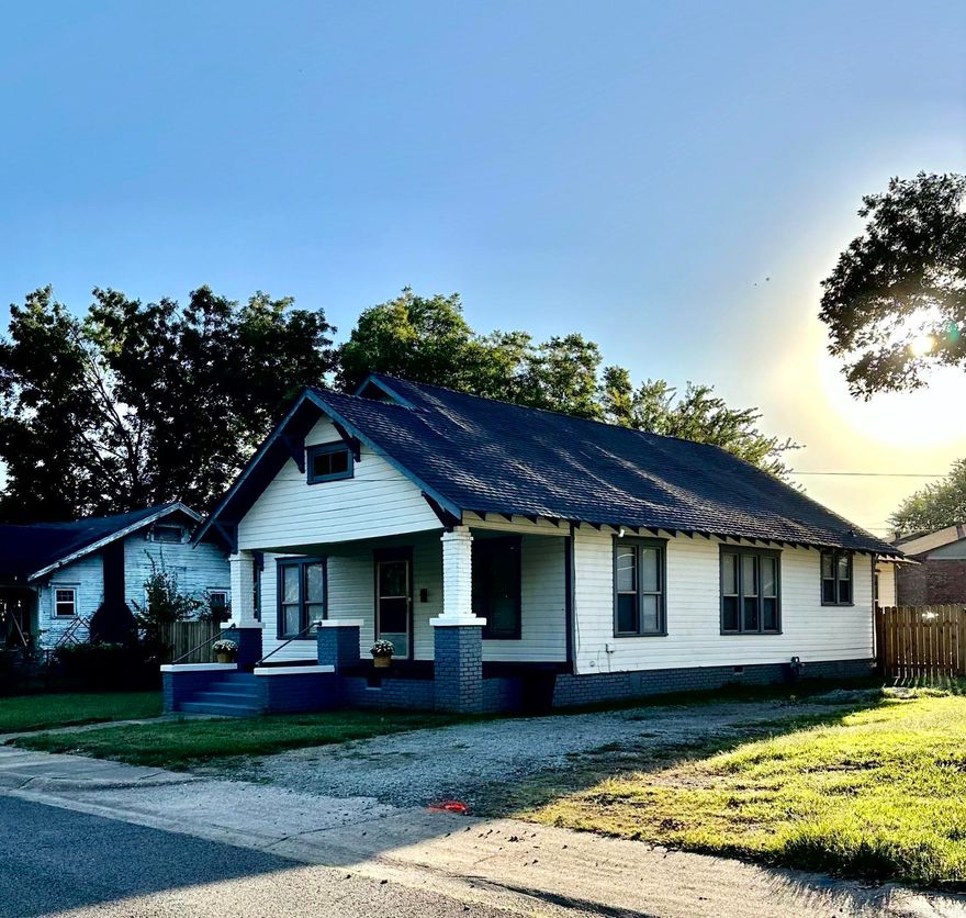 Located near Historic Downtown Clarksville & the Spadra Nature Trail this charming craftsman has been remodeled for the new homeowner.  Recently updated, paint, kitchen, bath!  Newer roof & HVAC.  Many original features include trim, moldings, wood flooring, & solid wood doors that add to the character.  Formal dining!  Spacious eat-in kitchen w/ new butcher block countertops & new appliances.  Update bath w/ all new fixtures!  One of the home's favorite amenities is the large front covered porch w/ original brick columns & new decking that will sure to be enjoyed for years to come!  Very nice back lawn with privacy fence and firepit area.